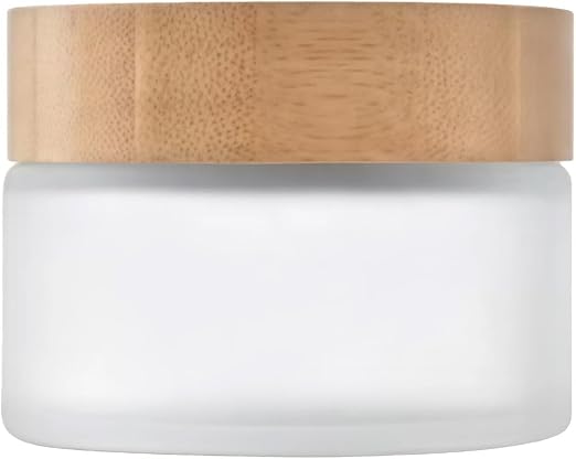 Azelaic acid cream in a frosted glass jar with bamboo lid